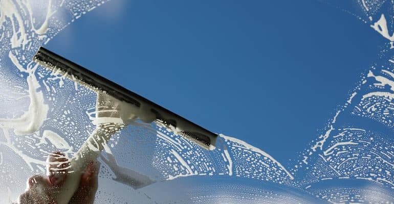 Pressure washing siding